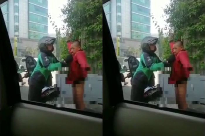 Driver ojol memberikan jaket kepada laki-laki keterbelakangan