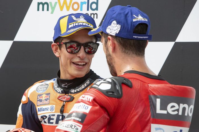Marc Marquez dan Andrea Dovizioso. Berat!