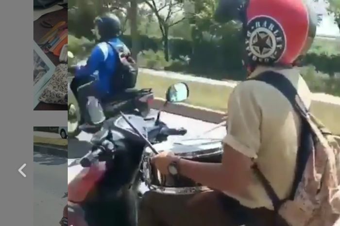 Pelajar berulah sambil mengendarai Yamaha Mio GT.