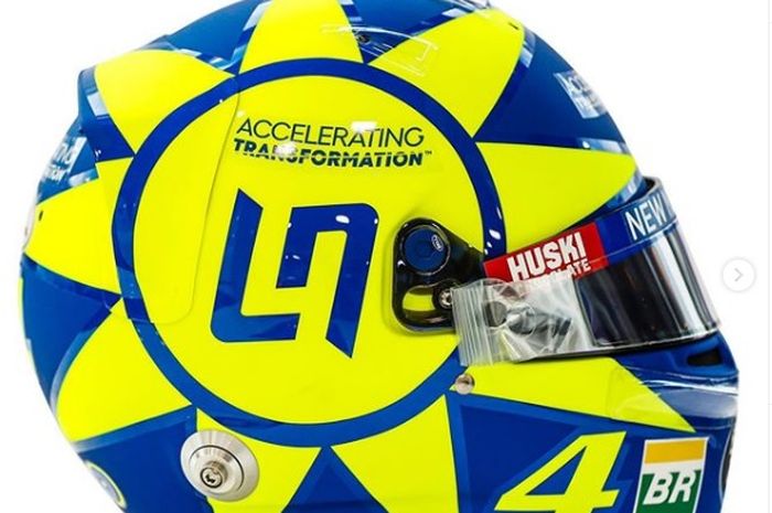 Helm dengan livery spesial dari Lando Norris untuk F1 Monza mirip dengan livery helm milik Valentino Rossi