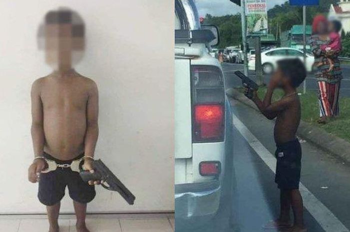 Bocah kecil meminta-minta di lampu merah sambil memegang pistol