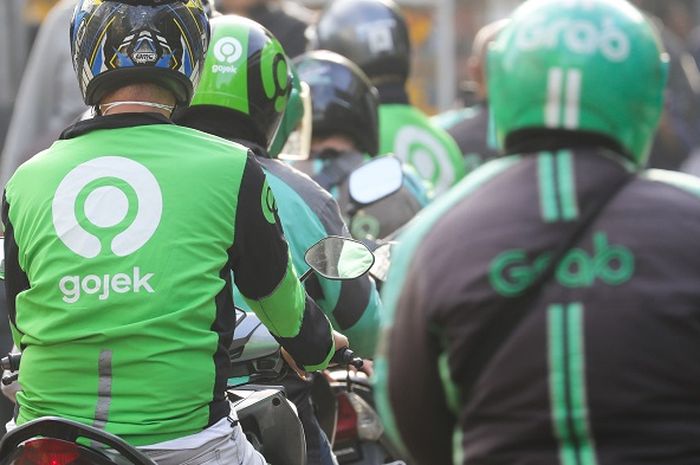 Ilustrasi ojek online Gojek dan Grab. Asosiasi Peritel Minta Pembebasan Tarif Parkir Untuk Ojol