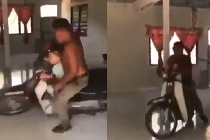 Seorang bapak-bapak ajak anaknya naik motor di dalam rumah.