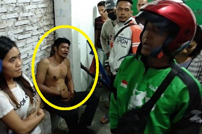 Rasyid, sekuriti yang mengaku sebagai anggota Brimob, diamankan warga karena dituduh berusaha membakar warung tahu goreng di Jalan Karya, Kelurahan Karang Berombak, Kecamatan Medan Barat, Senin (27/4/2020) dini hari. Pelaku sempat dihakimi warga. 