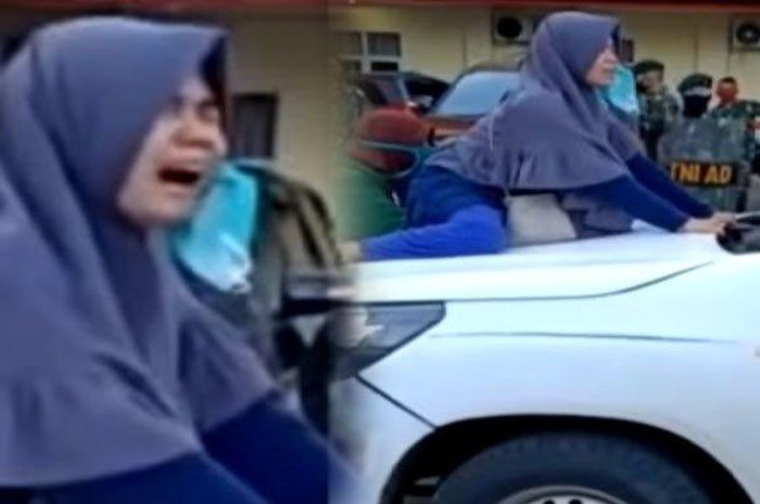 Video viral seorang gadis naik ke kap ambulans untuk menghalangi pemakaman PDP Covid-19 di Gowa, Sulawesi Selatan. 