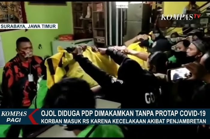 Ratusan driver ojol di Surabaya datangi kamar jenazah RS Dokter Sutomo untuk meminta rekannya dimakamkan tanpa protokol Covid-19, Minggu (7/6/2020).