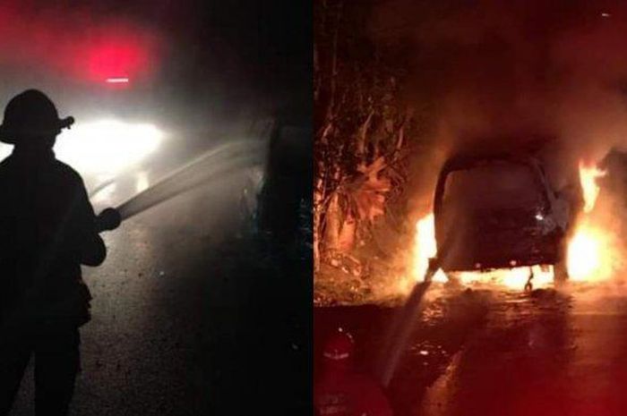 Petugas Damkar BPBD Kota Denpasar melakukan pemadaman pada mobil terbakar Jalan Kusuma Bangsa VI, Pemecutan Kaja, Denpasar Utara, Kota Denpasar, Bali, pada Jumat (10/7/2020) dini hari. 