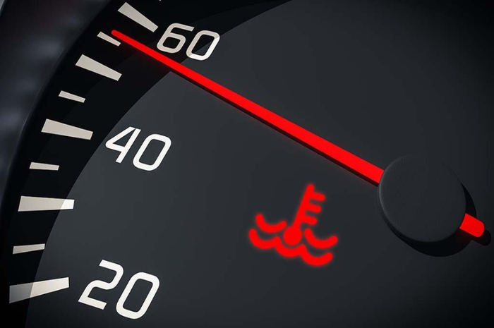 Ilustrasi indikator mesin overheat di mobil.