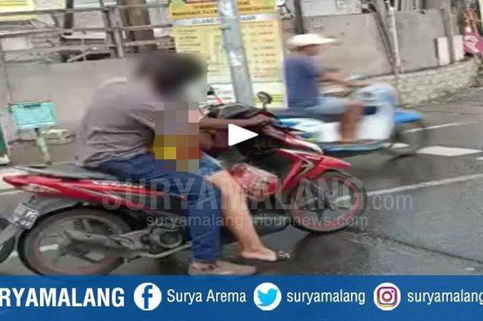 Salah satu adegan dalam video dua orang yang bertindak mesum di atas motor yang dilakukan di tengah jalan Kenjeran Surabaya. Video ini viral dan kasusnya ditangani Polrestabes Surabaya. 