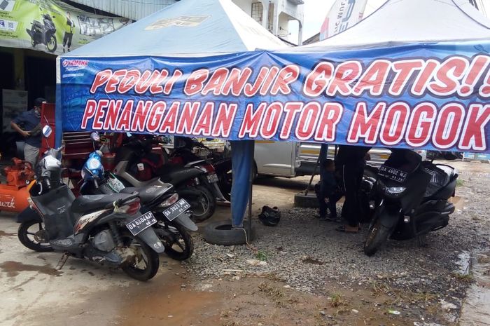 Bentuk kepedulian Yamaha dengan mendirikan pos servis gratis berbagai merek