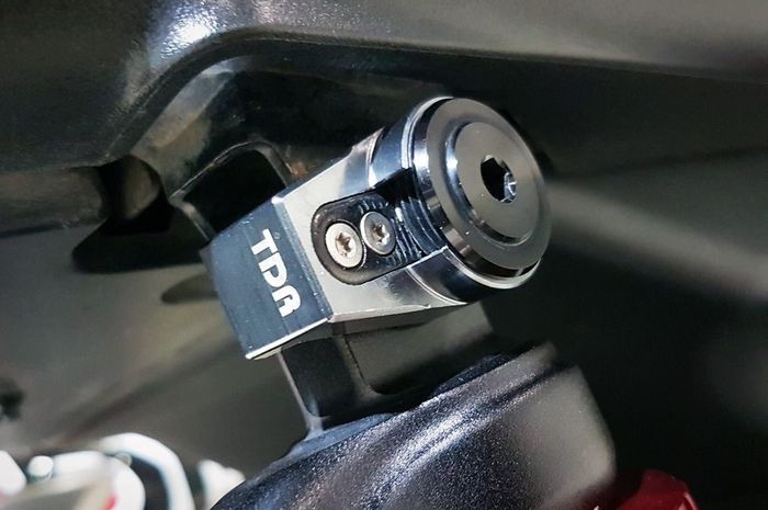 Suspension lock TDR sebagai pengaman sokbreker belakang di motor