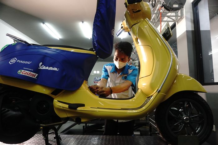 ilustrasi servis Vespa