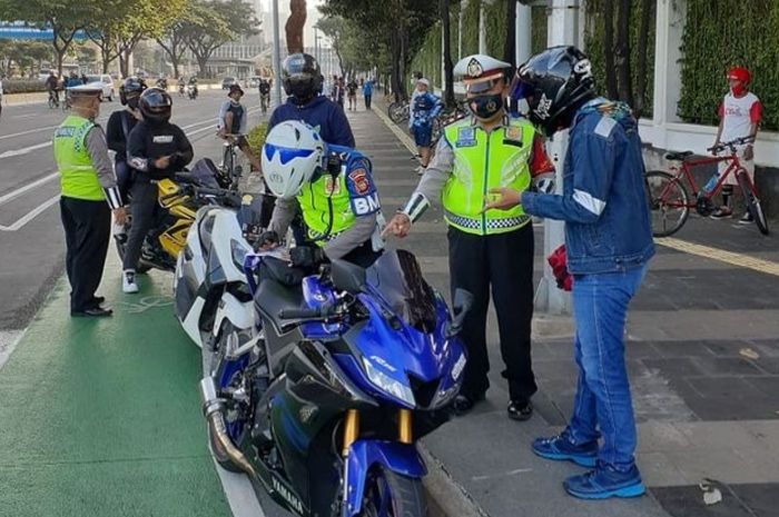 Ilustrasi Polisi razia kendaraan gunakan knalpor brong di Jakarta
