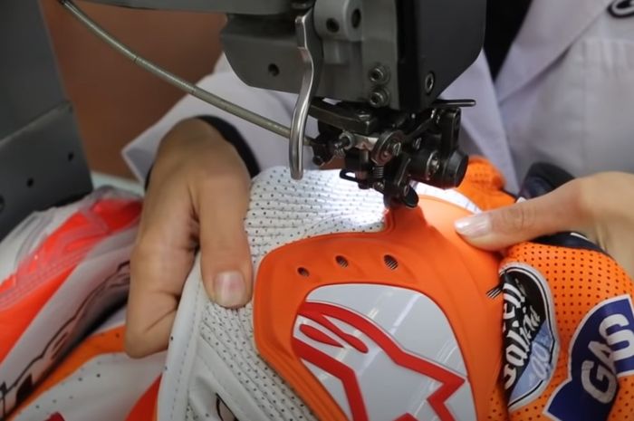 Ilustrasi reparasi wearpack balap