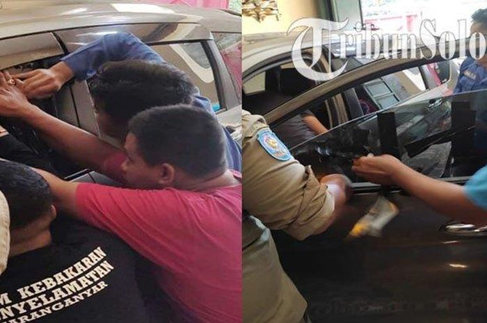 Petugas Damkar Karanganyar membuka paksa pintu dengan lakman dan potret bocah dua tahun yang terjebak di dalam mobil berhasil dievakuasi di Tegalarum, Kelurahan Cangakan, Kecamatan/Kabupaten Karanganyar, Minggu (17/4/2022). 