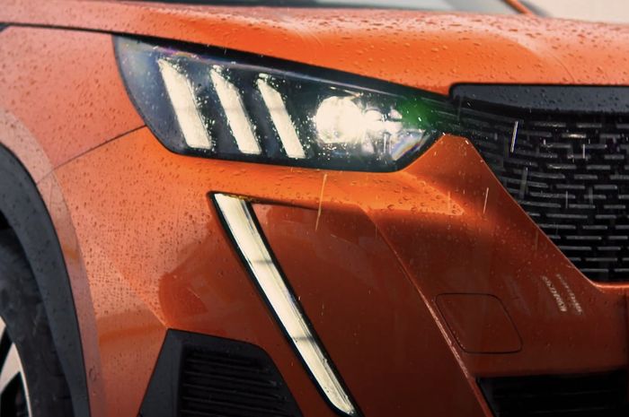 ILUSTRASI. Sorot Lampu Mobil