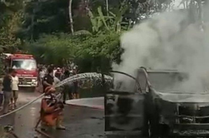 Pemadam kebakaran menyemprot air ke Toyota Alphard yang terbakar di Ungaran Barat, kabupaten Semarang