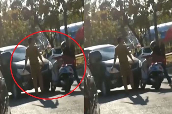 tangkap layar video viral oknum ASN di Sinjai menendang motor matic milik seorang pengendara cewek.