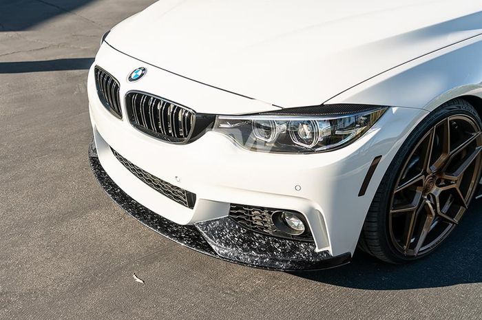 Lips spoiler menggunakan material carbon forged