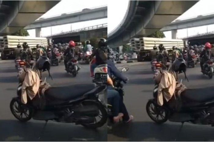 Sebuah motor yang parkir di tengah Jalan S Parman arah Grogol, Jakarta Barat, viral di media sosial pada Jumat (23/9/2022). 