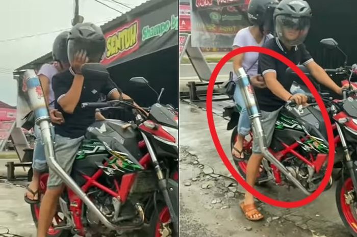 Honda CB150R dengan posisi knalpot mendongak ke atas.