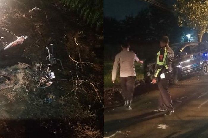 Petugas Unit Gakkum Satlantas Polres Mojokerto melakukan olah TKP di lokasi kecelakaan adu banteng Toyota Avanza dengan Honda BeAT.