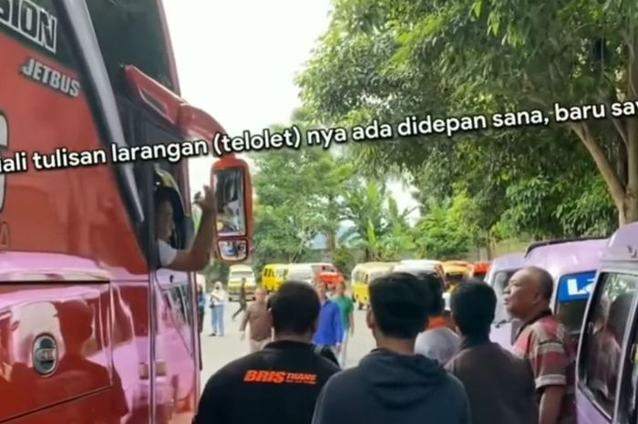 Tangkap layar adu mulut antara sopir bus pariwisata dan sopir angkot di Kota Batu, Jawa Timur. Biang perkaranya klakson telolet.