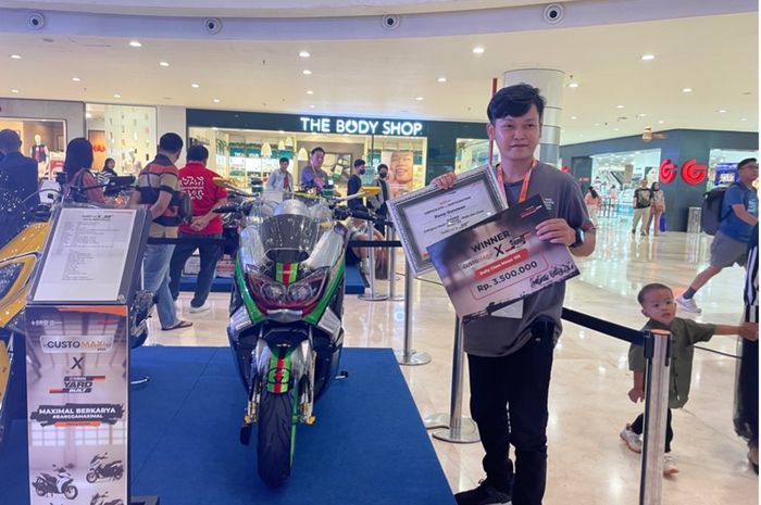 juara 1 di kelas Daily Use NMAX di Customaxi X Yard Built 2023, Romy Gunawan.