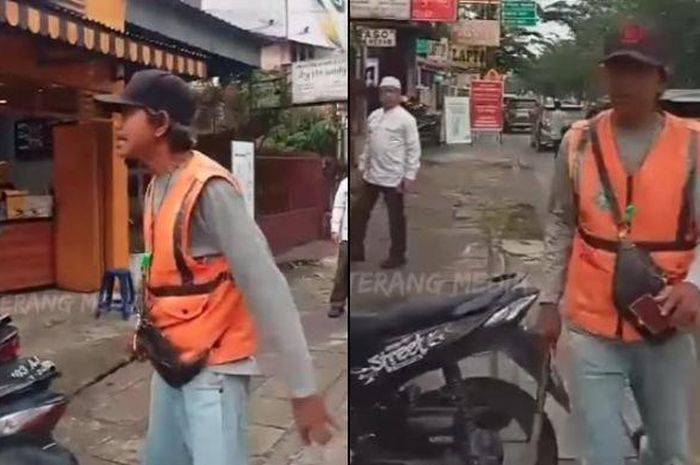 Tukang parkir bersenjata martil besi hendak pukul kepala pengojek online di Jl Sisingamangaraja, kota Medan, Sumatera Utara