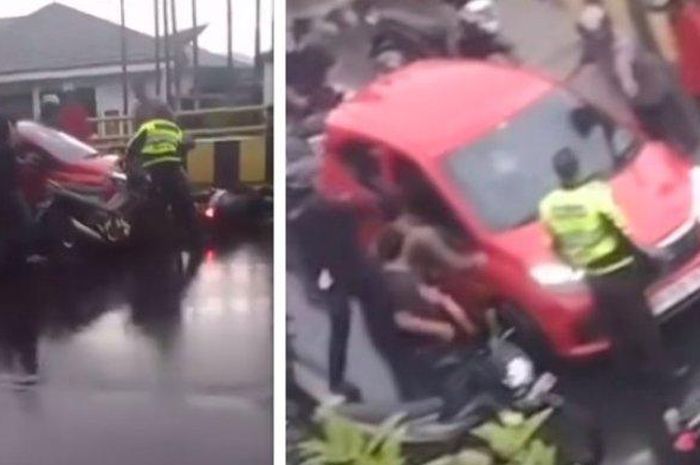 Honda Brio merah dicegat Polisi dan warga di kota Banjarmasin, Kalimantan Selatan