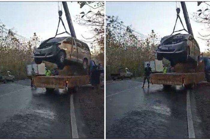 Toyota Alphard nopol L 1814 IK dikatrol ke atas truk towing setelah kecelakaan dengan truk boks di jalur Cepu-Blora, Kalimodang, desa Sambongrejo, Sambong, Blora, Jawa Tengah