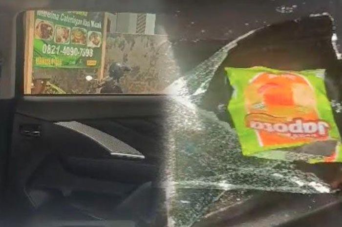 Kaca pintu tengah sebelah kiri Mitsubishi Xpander dinas Bawaslu Ponorogo dibobol maling hingga pecah