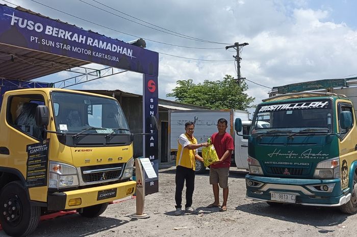 Mitsubishi Fuso dan Sun Star Motor Kbagi sembako gratis