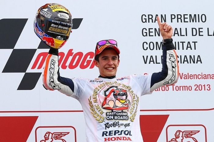 Marc Marquez (ESP/ Honda) celebrates on the podium after winning the world championship during the M