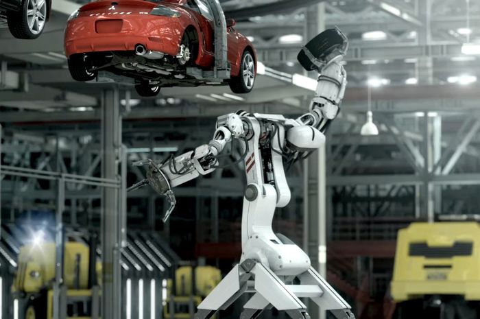 Ilustrasi pabrik yang menggunakan robot untuk merakit mobil