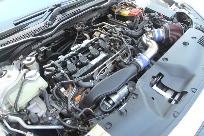 ILUSTRASI. Power mesin mobil Honda melonjak setelah remap ECU
