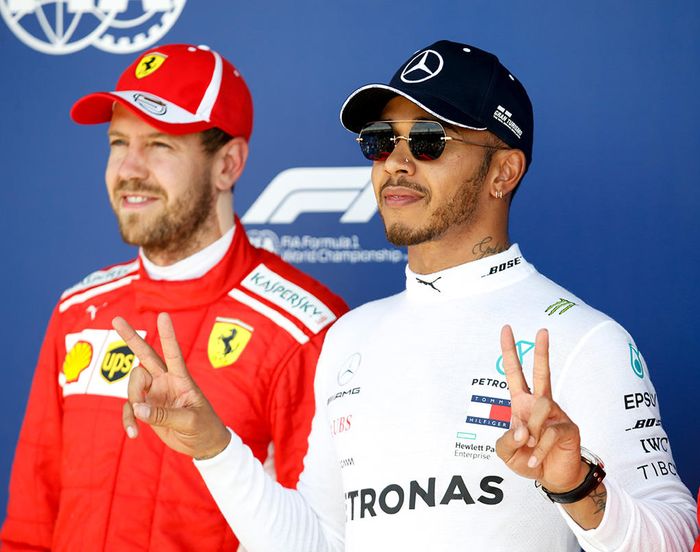 Lewis Hamilton dan Sebastian Vettel bersaing menjadi yang terbaik di musim 2018