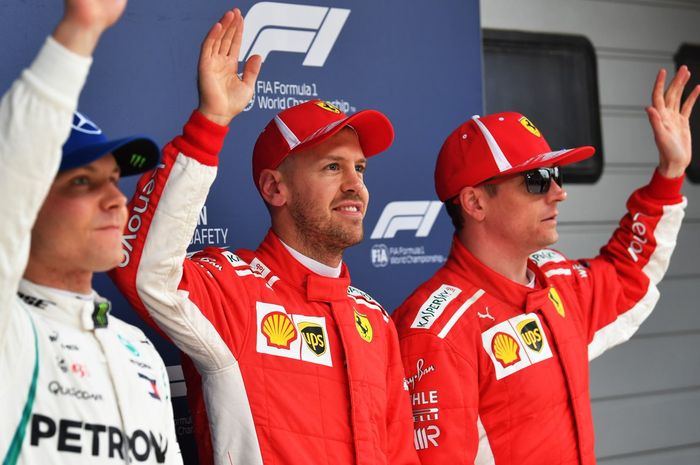 Sebastian Vettel dan Kimi Raikkonen menempati posisi start terdepan dan bikin rekor lap tercepat