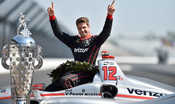 Will Power dengan trofi khas untuk pemenang balap di Indianapolis 500