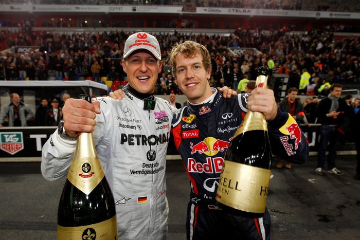 Michael Schumacher bersama Sebastian Vettel di ajang Race of Champions