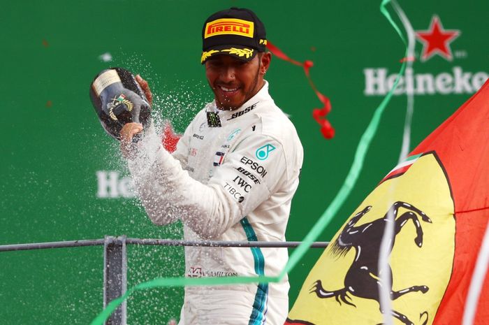 Lewis Hamilton menerima aura negatif tifosi Ferrari yang ditujukan padanya untuk dijadikan hal positif saat memenangkan GP F1 Italia