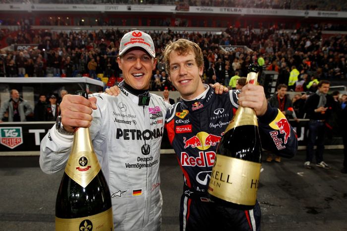 Michael Schumacher bersama Sebastian Vettel 