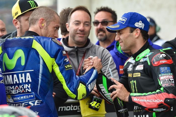 Valentino Rossi (kiri) dan Johann Zarco (kanan)