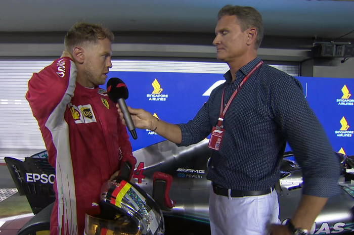 Sebastian Vettel diwawancarai oleh mantan pembalap F1, David Coulthard