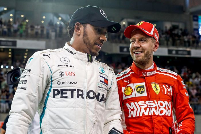 Lewis Hamilton dan Sebastian Vettel usai kualifikasi GP F1 Abu Dhabi