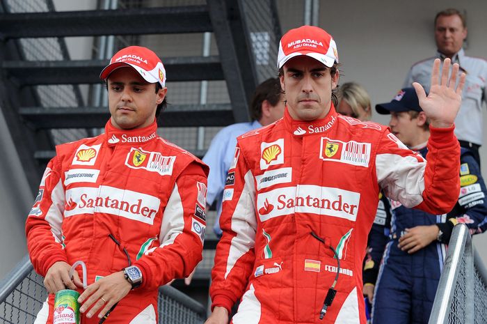 Felipe Massa (kiri) dan Fernando Alonso (kanan)