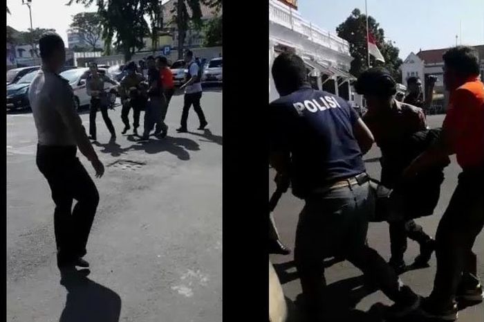 Penyelamatan petugas polisi terhadap bocah yang dibonceng pelaku peledakan bom di Mapolrestabes Sura