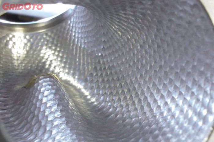 Porting permukaan head silinder seperti bola golf