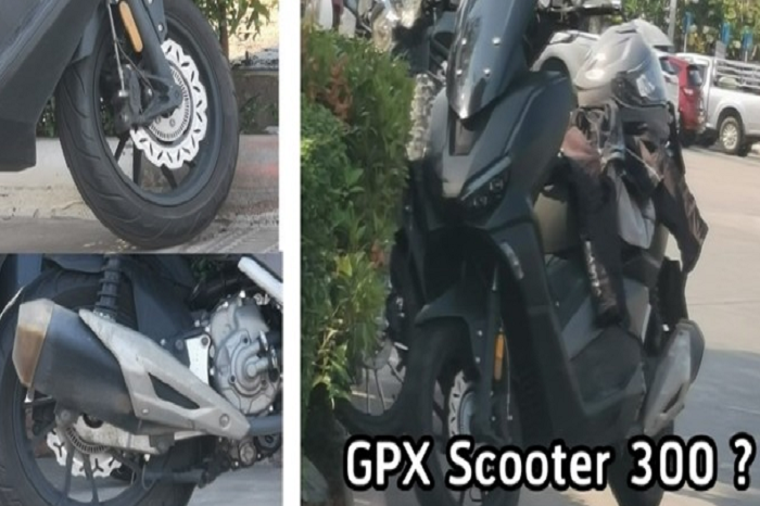 Motor baru dari GPX Racing terciduk melintas di jalan raya.