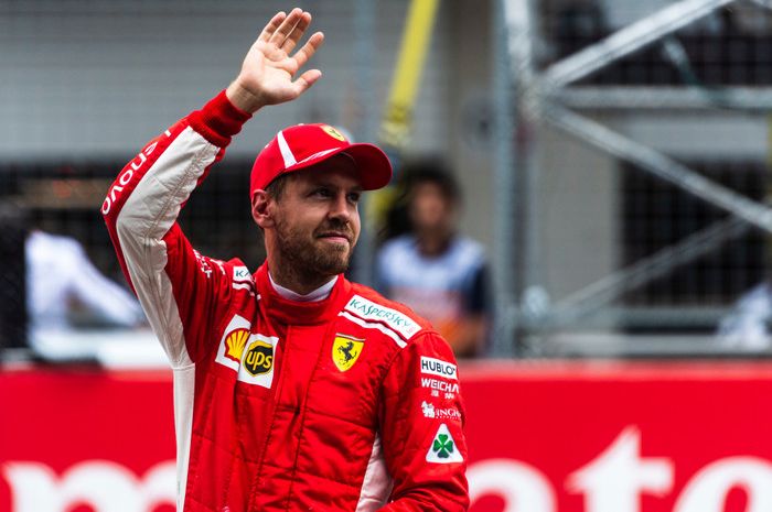 Sebastian Vettel mendapat penalti mundur tiga posisi start di GP F1 Austria